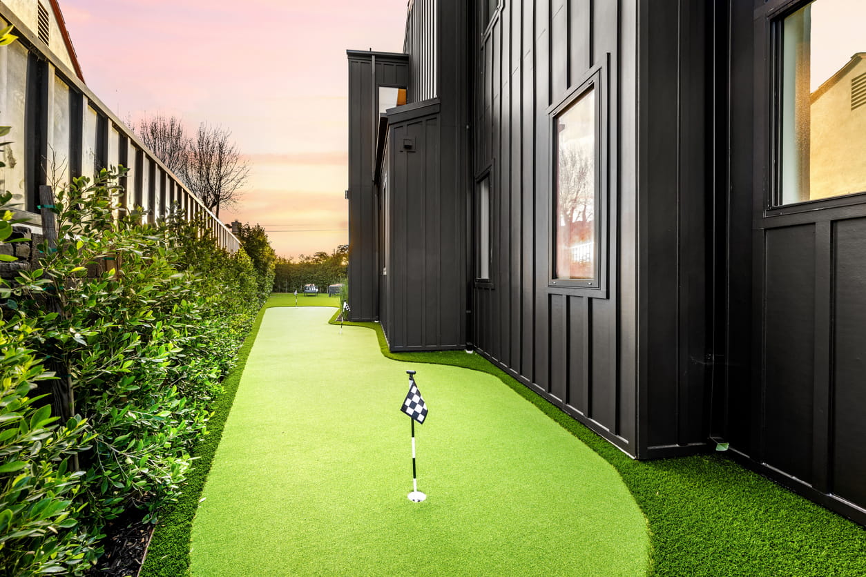 backyards with putting greens compact design style.jpg