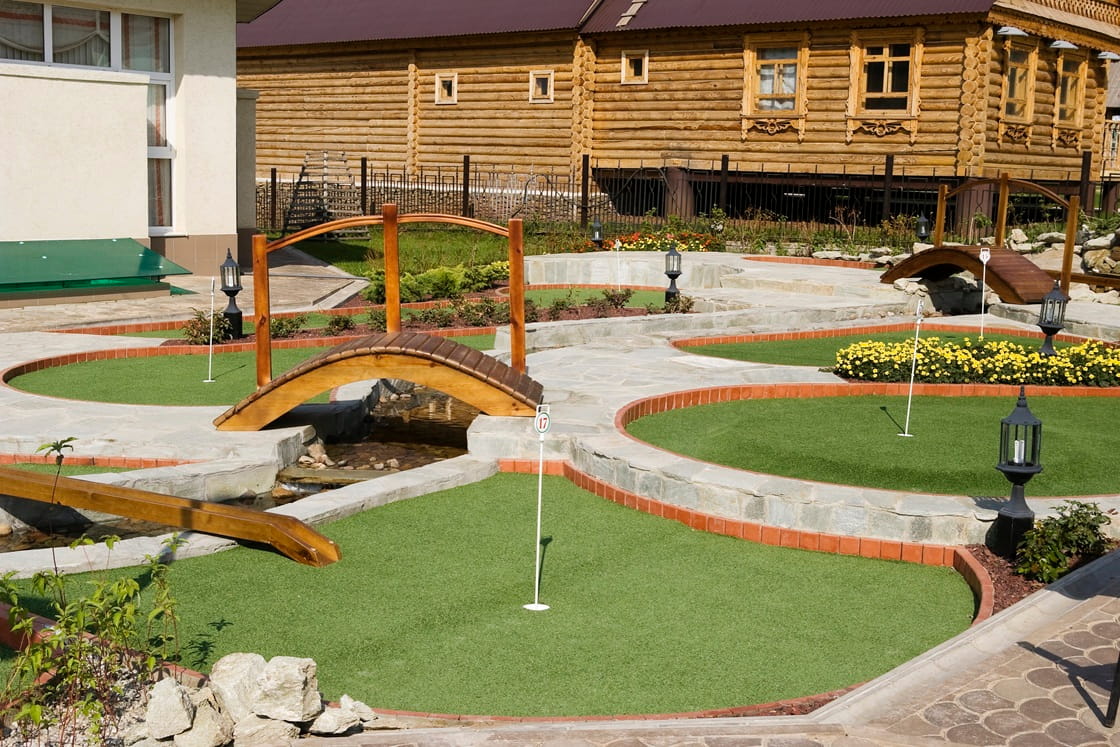 backyards with putting greens water feature design style